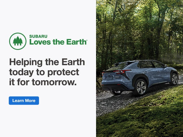 Subaru Loves the Earth. Subaru Solterra driving on a grave