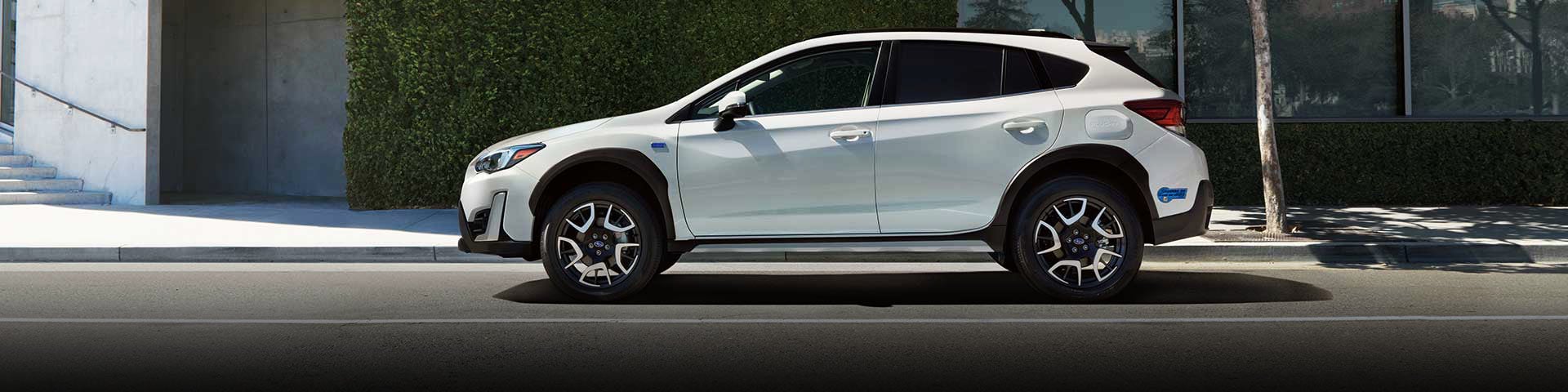 The side profile of a white Subaru Crosstrek Hybrid | Puente Hills Subaru in City of Industry CA