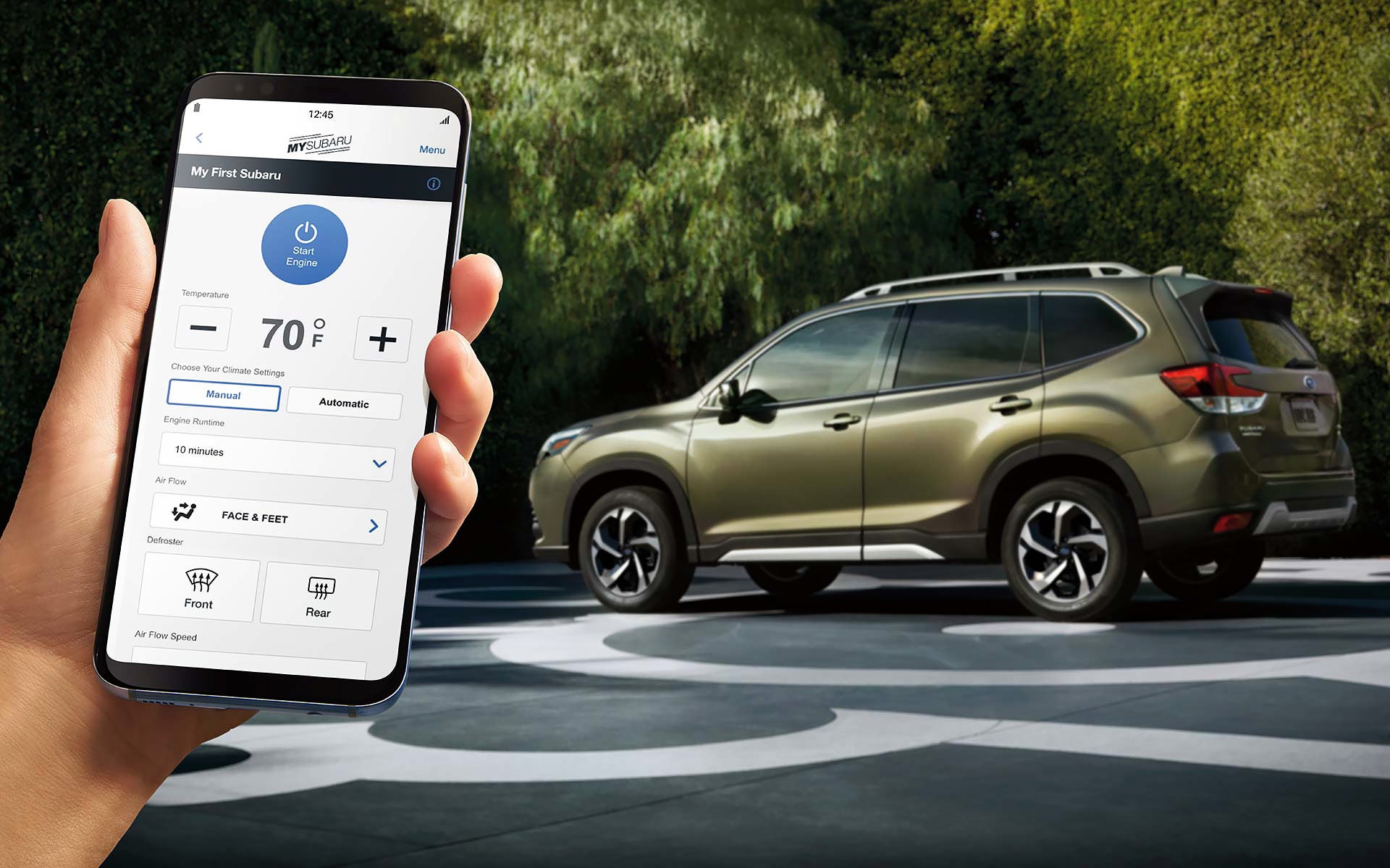 A close-up of a phone showing the Remote Engine Start with Climate Control feature of SUBARU STARLINK® Safety and Security available on the 2022 Forester. | Puente Hills Subaru in City of Industry CA